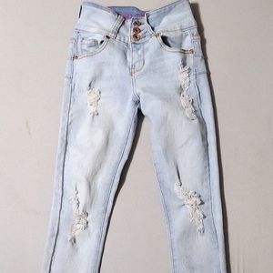 Girls ripped, skinny jeans